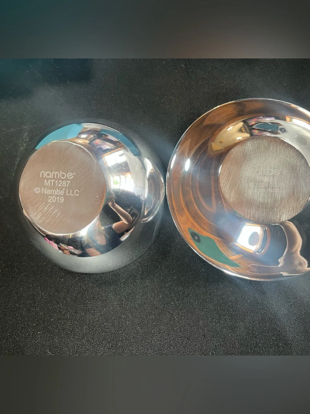 Set of 2 NAMBE’ items. Bowl and candleholder. Silver tone. Pre-owned